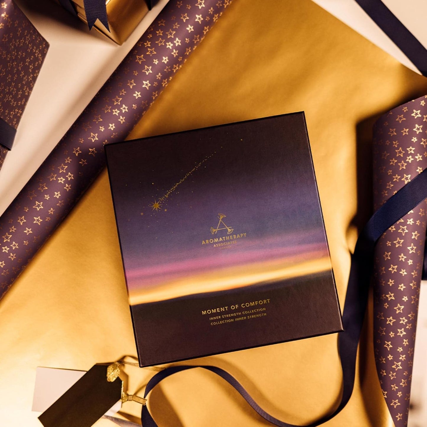 Aromatherapy Associates Moment of Comfort. Luxurious Holiday Gift Set Includes Inner Strength Bath and Shower Oil, Roller Ball, Body Oil, and Body Treatment (1 count)